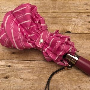 Pink Coach logo umbrella